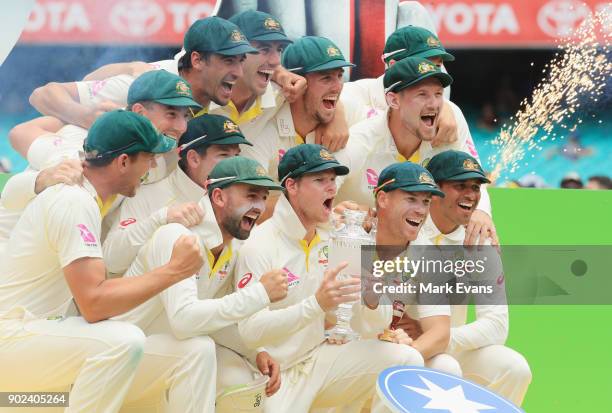 The Australians pose for a team photo after winning the Ashes during day five of the Fifth Test match in the 2017/18 Ashes Series between Australia...