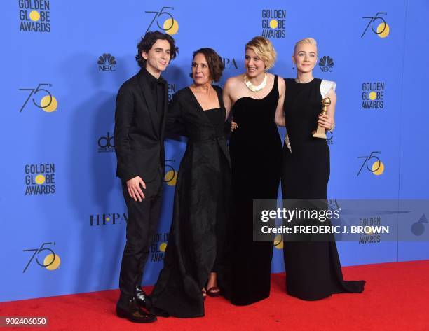 Timothee Chalamet, Laurie Metcalf, Greta Gerwig and Saoirse Ronan poses with the award for Best Motion Picture Musical or Comedy in 'Lady Bird'...