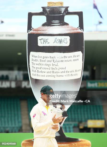 Steve Smith of Australia is presented with the Ashes trophy after winning the Ashes during day five of the Fifth Test match in the 2017/18 Ashes...