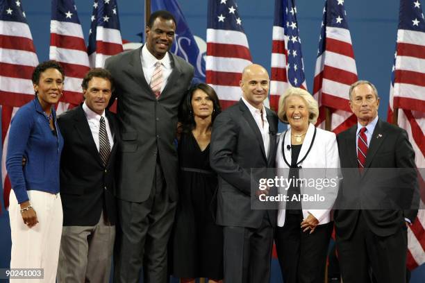 Robin Roberts , Doug Flutie, David Robinson, Mia Hamm, Andre Agassi, Lucy Garvin and New York City Mayor Michael Bloomberg pose for a photo during...
