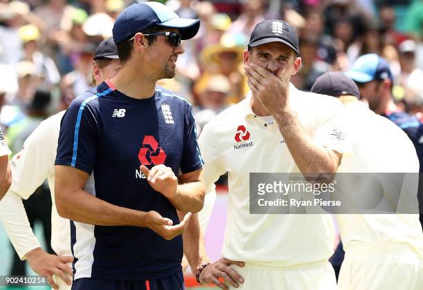 Alastair Cook and James Anderson of England look on during the presentation day five of the Fifth Test match in the 2017/18 Ashes Series between...