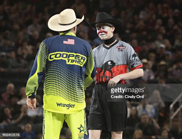 Flint Rasmussen speaks to a fan dressed like him during the 2018 Professional Bull Riders Monster Energy Buck Off at the Garden at Madison Square...