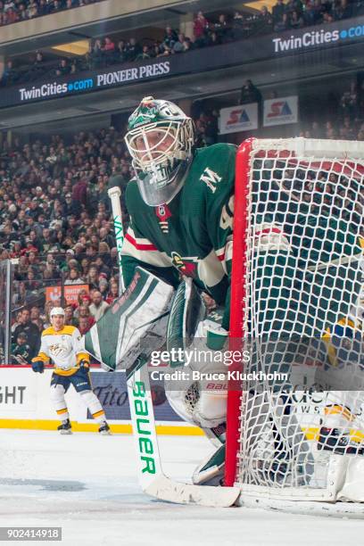 Devan Dubnyk of the Minnesota Wild defends his goal against the Nashville Predators during the game at the Xcel Energy Center on December 29, 2017 in...