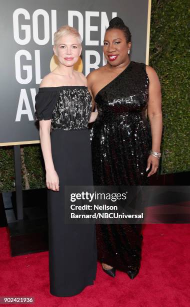 75th ANNUAL GOLDEN GLOBE AWARDS -- Pictured: Actor Michelle Williams and activist Tarana Burke arrive to the 75th Annual Golden Globe Awards held at...