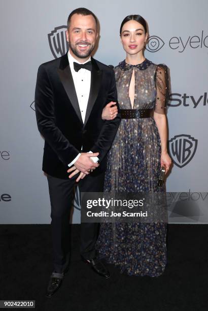 Personality Darren McMullen and Crystal Reed attend the 2018 InStyle and Warner Bros. 75th Annual Golden Globe Awards Post-Party at The Beverly...