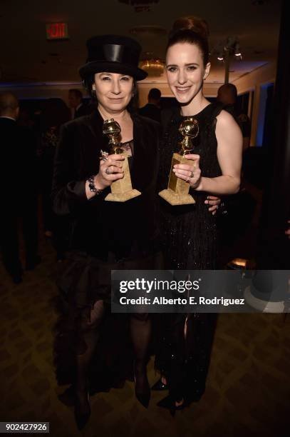 Writer/producer Amy Sherman-Palladino and actor Rachel Brosnahan pose with award at Amazon Studios' Golden Globes Celebration at The Beverly Hilton...