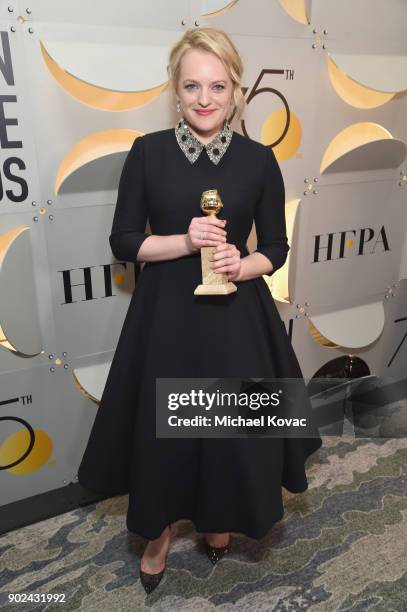 Actor Elisabeth Moss celebrates The 75th Annual Golden Globe Awards with Moet & Chandon at The Beverly Hilton Hotel on January 7, 2018 in Beverly...