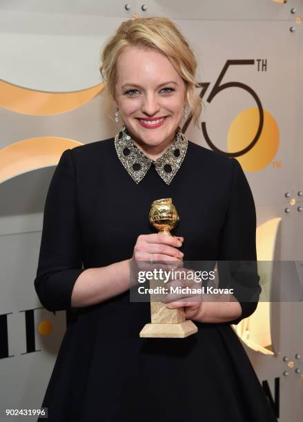 Actor Elisabeth Moss celebrates The 75th Annual Golden Globe Awards with Moet & Chandon at The Beverly Hilton Hotel on January 7, 2018 in Beverly...