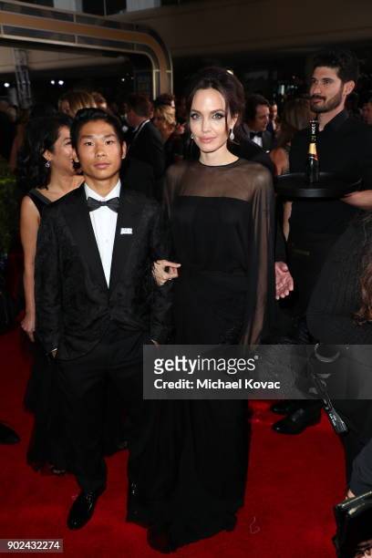 Pax Thien Jolie-Pitt and Angelina Jolie attend the 75th Annual Golden Globe Awards held at the Beverly Hilton Hotel on January 7, 2018.