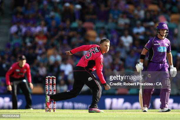 Johan Botha of the Sydney Sixers bowls during the Big Bash League match between the Hobart Hurricanes and the Sydney Sixers at Blundstone Arena on...