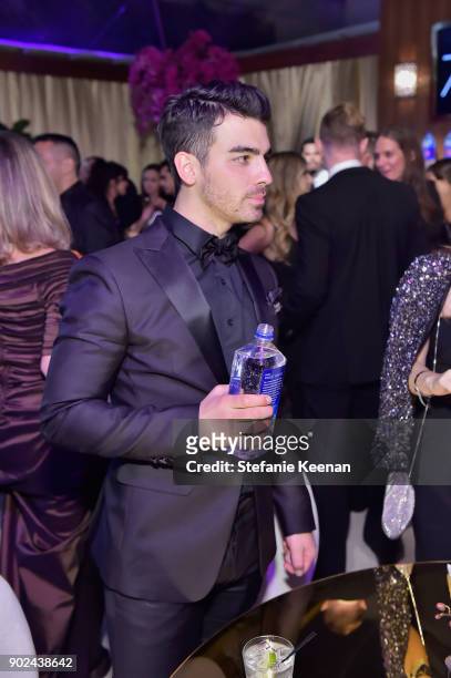 Singer Nick Jonas attends FIJI Water at HFPAs Official Viewing and After-Party at the Wilshire Garden inside The Beverly Hilton on January 7, 2018...