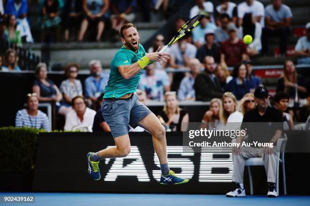 Michael Venus of New Zealand plays a shot in his first round match against Roberto Bautista Agut of Spain during day one of the ASB Men's Classic at...