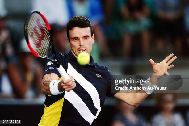 Roberto Bautista Agut of Spain plays a forehand in his first round match against Michael Venus of New Zealand during day one of the ASB Men's Classic...