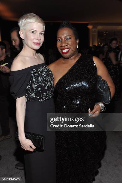 Actor Michelle Willams and activist Tarana Burke attend the 2018 InStyle and Warner Bros. 75th Annual Golden Globe Awards Post-Party at The Beverly...