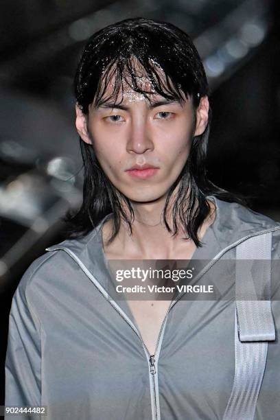 Model walks the runway at the Cottweiler show during London Fashion Week Men's Fall/Winter 2018/2019 in January 2018 at Natural History Museum on...