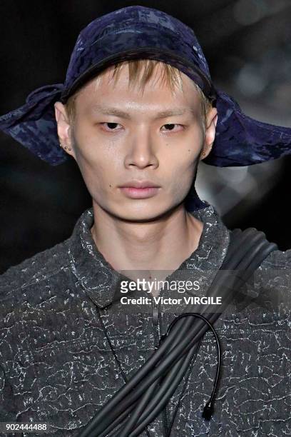 Model walks the runway at the Cottweiler show during London Fashion Week Men's Fall/Winter 2018/2019 in January 2018 at Natural History Museum on...