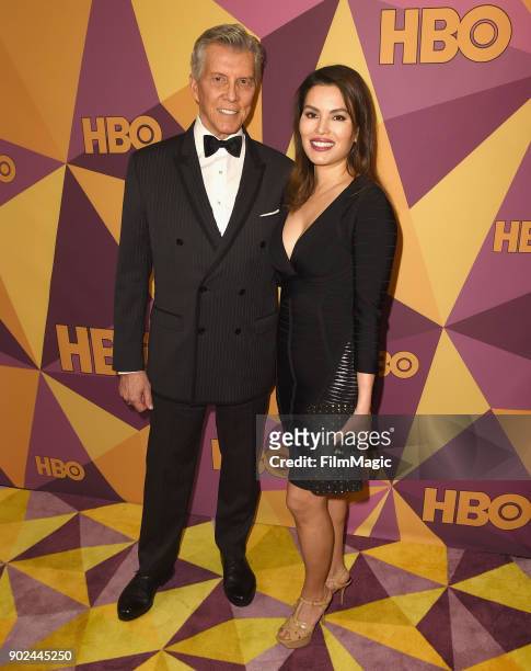 Michael Buffer and Christine Prado attend HBO's Official 2018 Golden Globe Awards After Party on January 7, 2018 in Los Angeles, California.