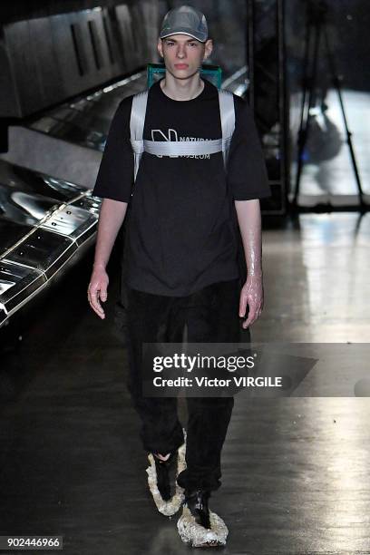 Model walks the runway at the Cottweiler show during London Fashion Week Men's Fall/Winter 2018/2019 in January 2018 at Natural History Museum on...