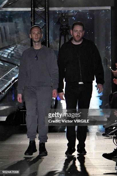 Ben Cottrell and Matthew Dainty walk the runway at the Cottweiler show during London Fashion Week Men's Fall/Winter 2018/2019 in January 2018 at...