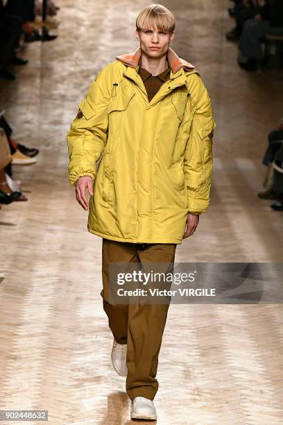 Model walks the runway at the Qasimi show during London Fashion Week Men's January 2018 at 100 Sydney Street on January 6, 2018 in London, England.