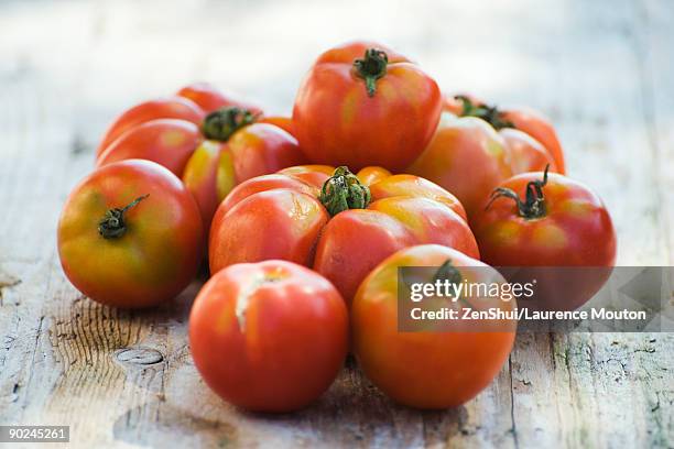 pile of ripe tomatoes - ugly wallpaper stock pictures, royalty-free photos & images