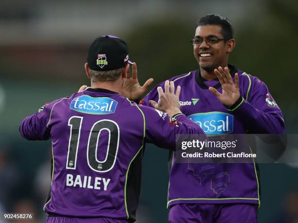Clive Rose of the Hurricanes celebrates taking the wicket of Jason Roy of the Sydney Sixers during the Big Bash League match between the Hobart...