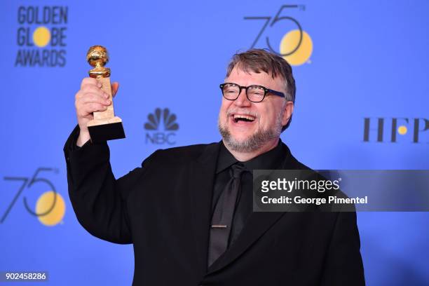 Filmmaker Guillermo del Toro, winner of the award for Best Director for 'The Shape of Water,' poses in the press room during The 75th Annual Golden...
