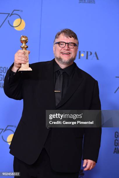 Filmmaker Guillermo del Toro, winner of the award for Best Director for 'The Shape of Water,' poses in the press room during The 75th Annual Golden...