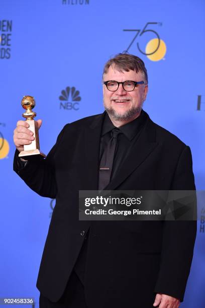 Filmmaker Guillermo del Toro, winner of the award for Best Director for 'The Shape of Water,' poses in the press room during The 75th Annual Golden...