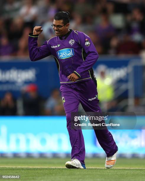 Clive Rose of the Hurricanes celebrates taking the wicket of Jason Roy of the Sydney Sixers during the Big Bash League match between the Hobart...