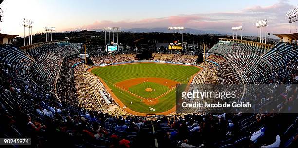 Wide angle view of the Los Angeles Dodgers Stadium as the Station fires burn in the distance on August 31, 2009 in Los Angeles, California.