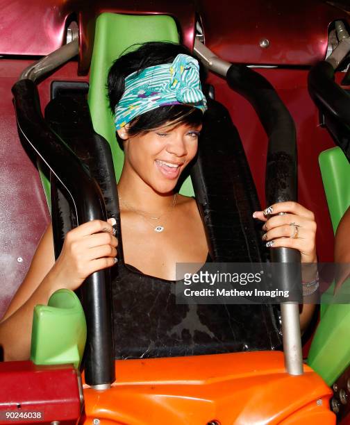 Singer Rihanna enjoys the Tatsu rollercoaster on a visit to Six Flags Magic Mountain on August 31, 2009 in Valencia, California.