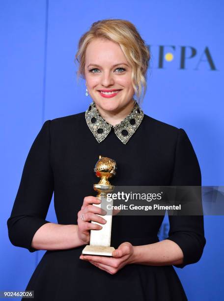Actor Elisabeth Moss, winner of the award for Outstanding Lead Actress in a Drama Series for 'The Handmaid's Tale,' attends The 75th Annual Golden...