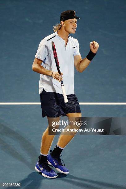 Denis Shapovalov of Canada celebrates winning a set in his first round match against Rogerio Dutra Silva of Brazil during day one of the ASB Men's...