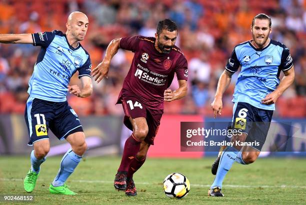 Fahid Ben Khalfallah of the Roar takes on the defence during the round 15 A-League match between the Brisbane Roar and Sydney FC at Suncorp Stadium...