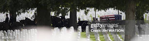 Marine Corps Sergeant William Cahir's casket is brought by cassion to his funeral serivce at Arlington National Cemetary in Arlington, VA, August 31,...