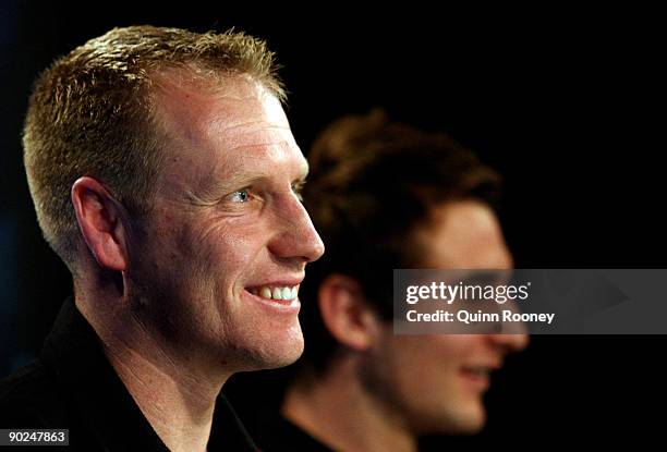 Essendon Bombers coach Matthew Knights and Jobe Watson of the Essendon Bombers address during an AFL Final Series media Conference at Fox Sports...