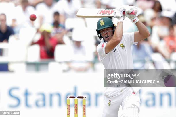 South African batsman AB de Villiers plays a shot during the fourth day of the first Test cricket match between South Africa and India at Newlands...