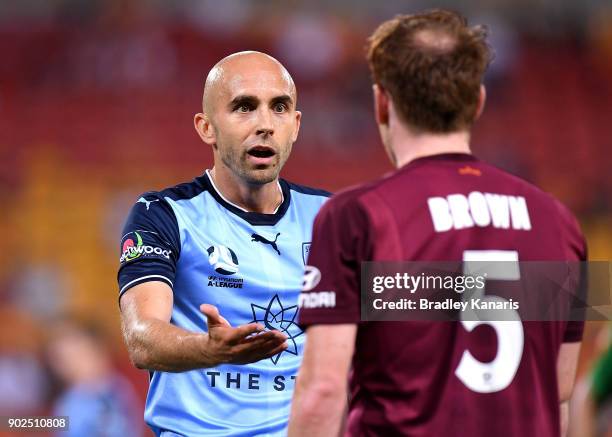 Adrian Mierzejewski of Sydney argues with Corey Brown of the Roar during the round 15 A-League match between the Brisbane Roar and Sydney FC at...