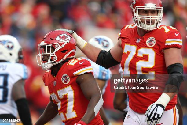 Kansas City Chiefs running back Kareem Hunt and offensive tackle Eric Fisher celebrate Hunt's 1-yard touchdown run with 2:56 left in the first...