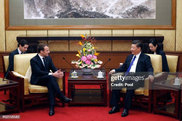 French President Emmanuel Macron meets with Chinese President Xi Jinping at the Diaoyutai State Guesthouse, during his three day state visit on...