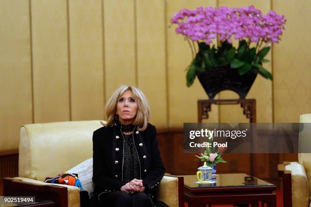 Brigitte Macron, wife of French President Emmanuel Macron looks during a meeting of Macron with Chinese President Xi Jinping, at the Diaoyutai State...