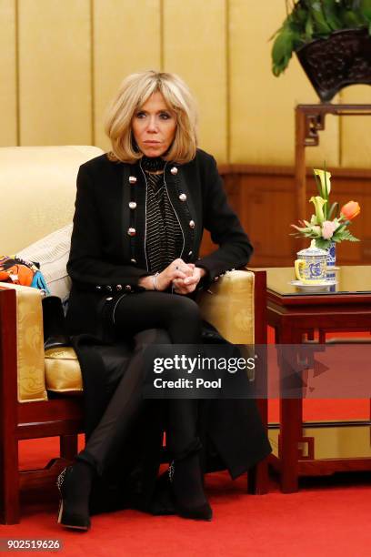 Brigitte Macron, wife of French President Emmanuel Macron looks during a meeting of Macron with Chinese President Xi Jinping, at the Diaoyutai State...