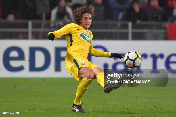 Paris Saint-Germain's French midfielder Adrien Rabiot kicks the balll during the French cup football match Rennes vs Paris SG at the Roazhon Park in...