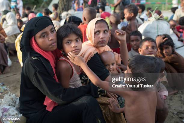 Rohingya Muslim refugees waiting to go camp after crossing the border from Myanmar in Teknaf on September 28, 2017. More than 2,000 Rohingya have...