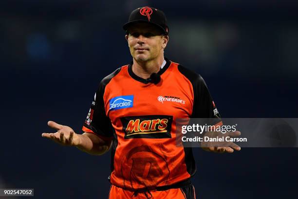 Brad Hodge of the Melbourne Renegades reacts to the Scorcher fans during the Big Bash League match between the Perth Scorchers and the Melbourne...