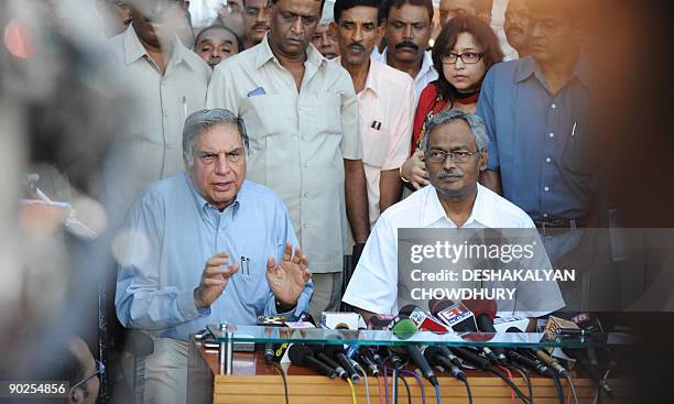 Tata Group Chairman Ratan Tata and West Bengal state Industrial Minister Nirupam Sen give a press conference in Kolkata on September 1, 2009. India's...