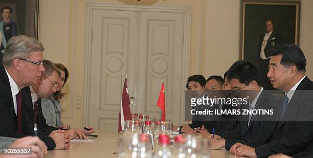 China's Vice Prime Minister Hui Liangyu and Latvian President Valdis Zatlers attend a meeting in Riga on September 1, 2009. Hui Liangyu is currently...