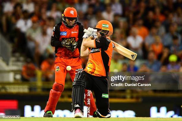 Tim Ludeman of the Melbourne Renegades collects the ball after a missed swing by David Willey of the Perth Scorchers during the Big Bash League match...