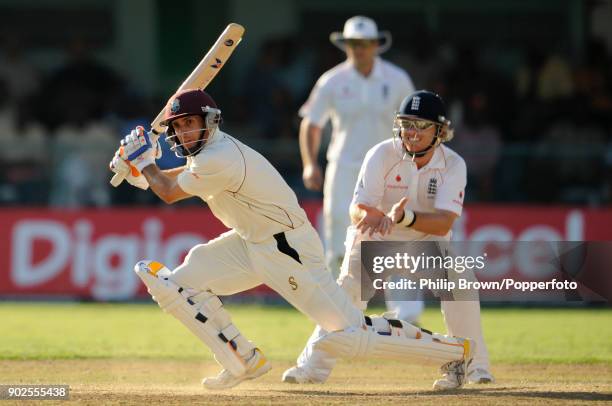 Brendan Nash batting for West Indies watched by England fielder Ian Bell during the 1st Test match between West Indies and England at Sabina Park,...